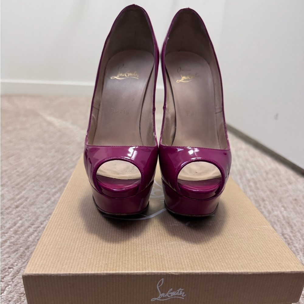 CHHRISTIAN LOUBOUTIN